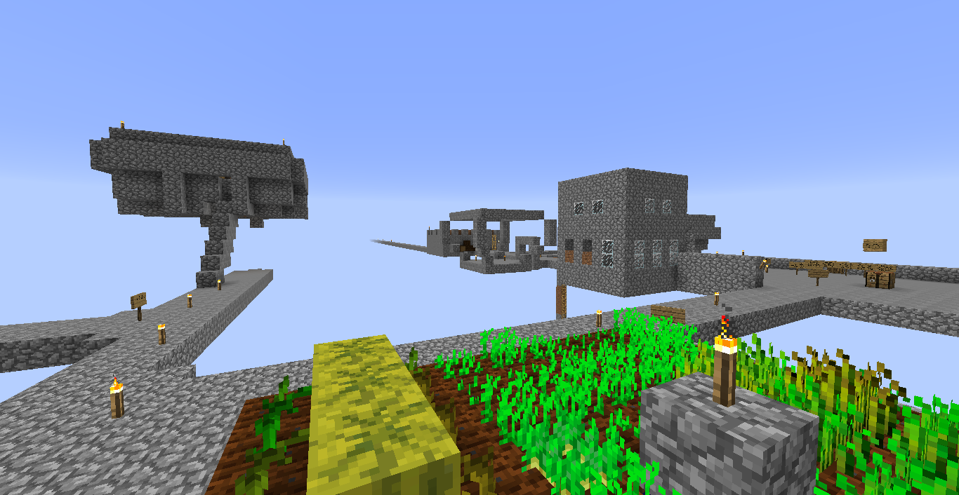 A build of a large structure with a garden in front of it.