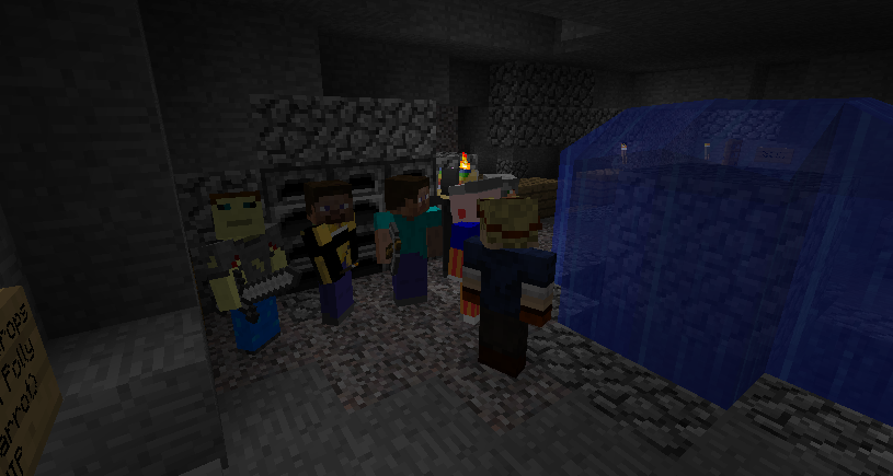 A group of players standing in a cave, with a large body of water to the right.