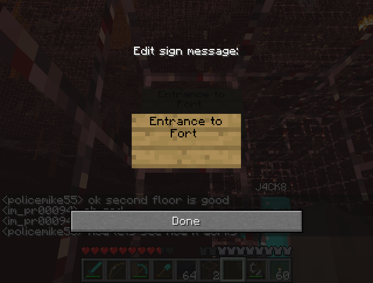 A sign that says 'Entrance to Fort' with a chat message above it.