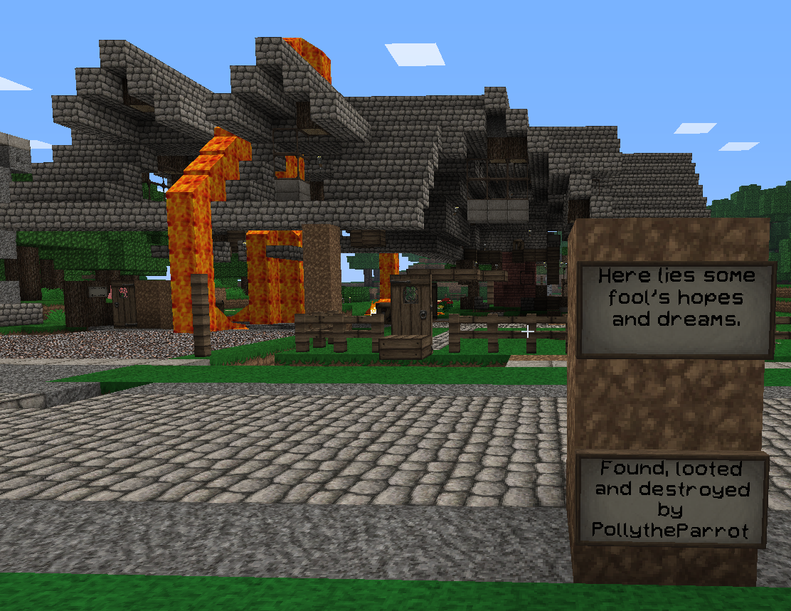 A destroyed base with a sign that reads 'Here lies some fool's hopes and dreams.'