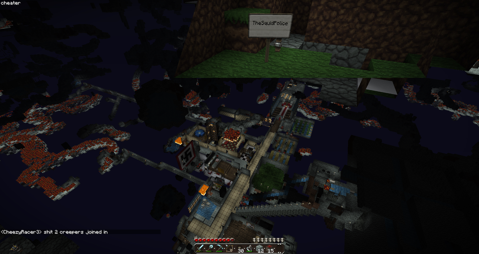 A large underground base with a grassy area and a sign that says 'TheSausagePlace'.