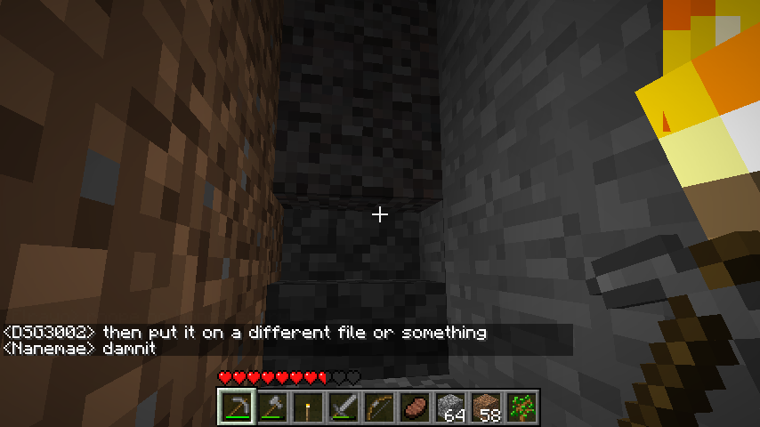 A player is in a cave with a chat message about putting something on a different file or something.