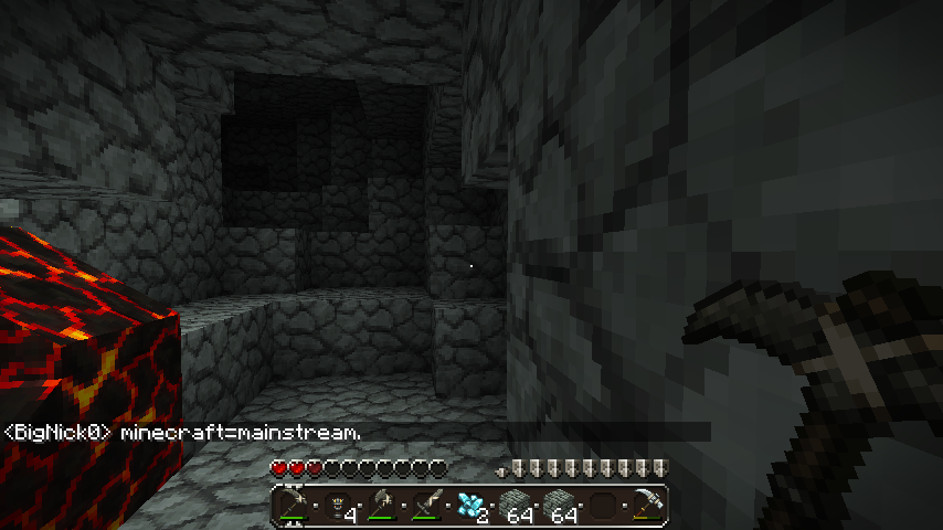A dark cave with lava and a player's inventory visible.
