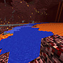 A large body of water with a bridge crossing it, surrounded by a desert biome.