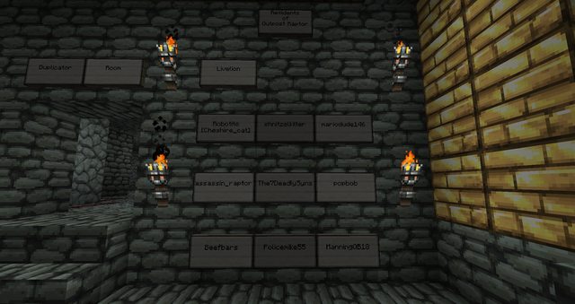 A wall of signs in a dimly lit room with torches, possibly a base or a build.