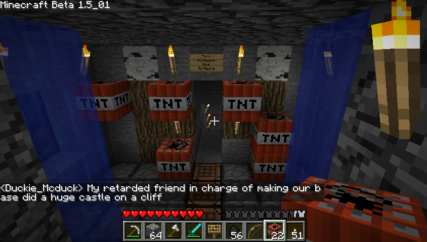 A large collection of TNT blocks in a cave, with a sign that reads 'Duckie_Moduck' and a chat message from the same player.