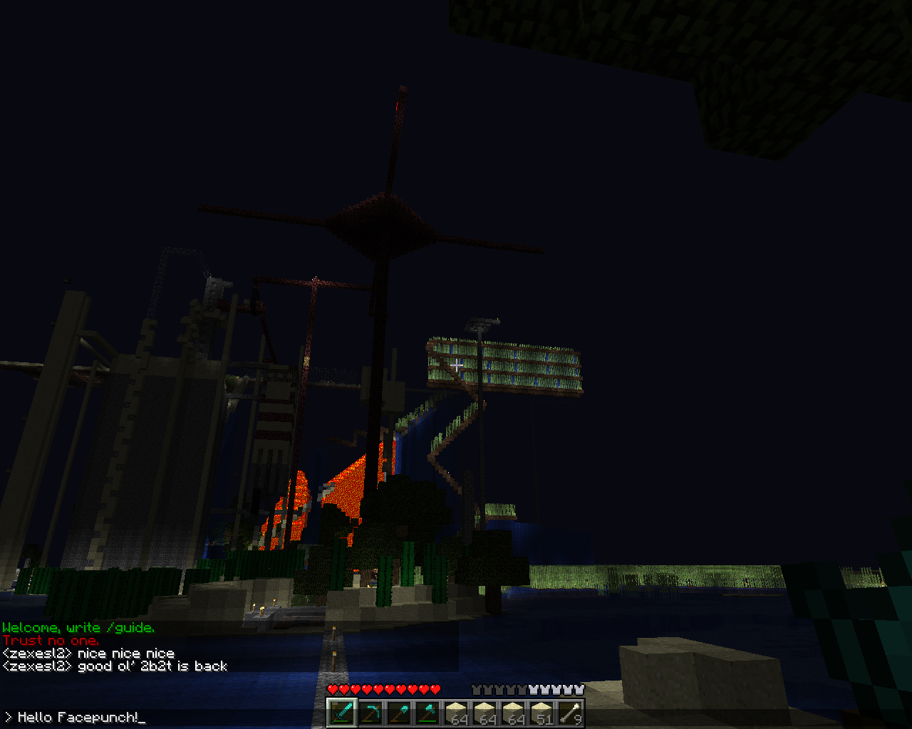 A large, dark structure with a red glow in the center, surrounded by water and featuring a prominent cross-like design.