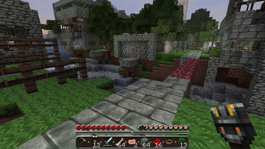 A screenshot of a Minecraft server with a stone path and a red carpet leading to a castle, surrounded by trees and other structures.