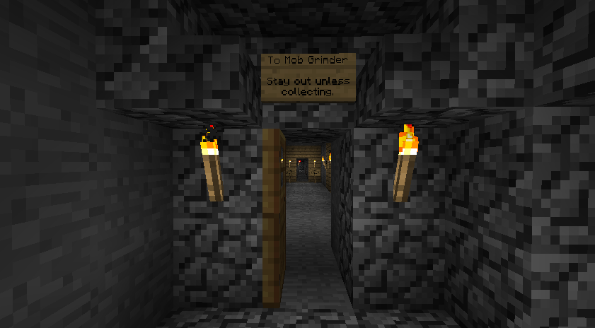 A dark hallway with a sign that says 'To Mob Grinder' and 'Stay out unless collecting.'