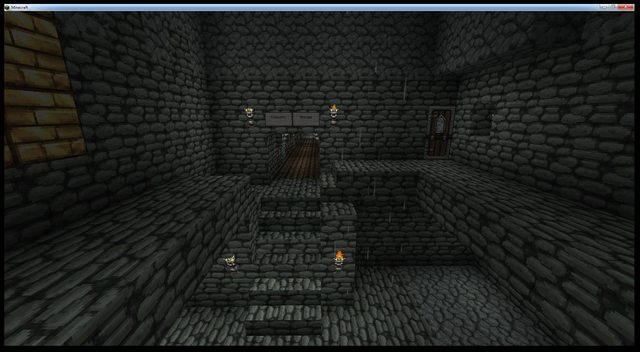 A dark, underground base with a staircase and several torches.