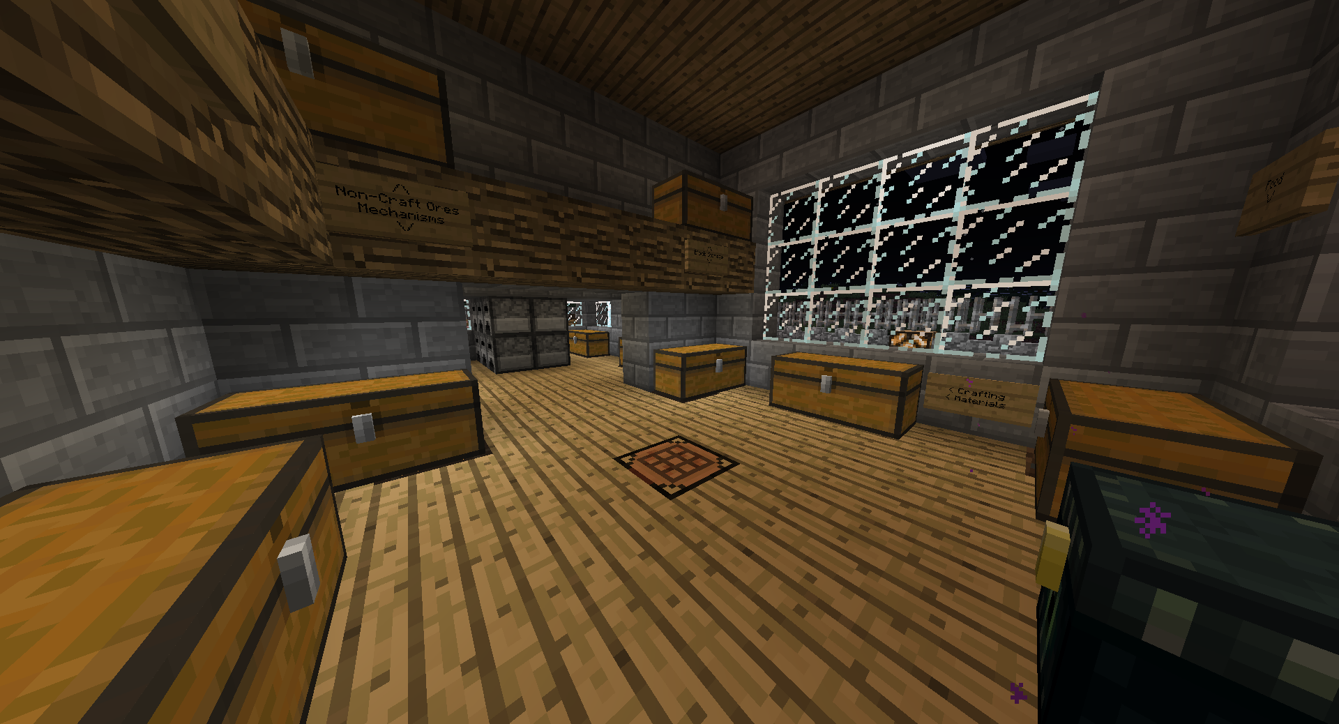 A room with many chests and a large window.