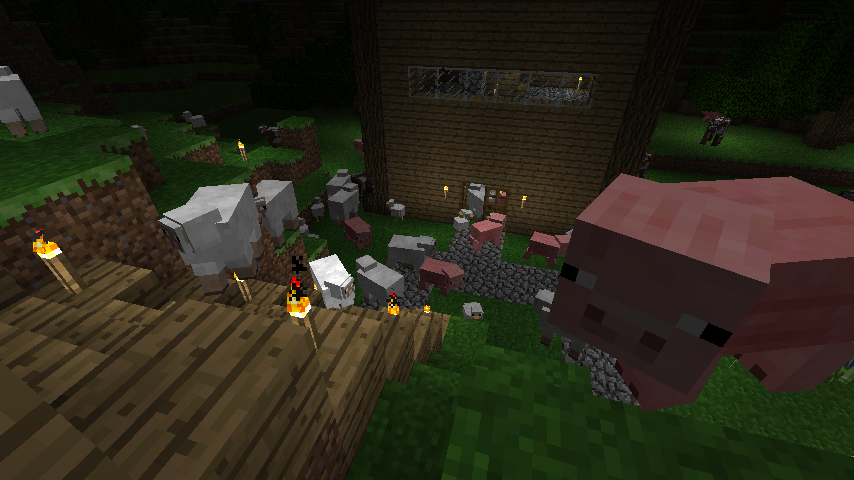 A large pig and several sheep are seen in front of a wooden structure, with a player nearby.