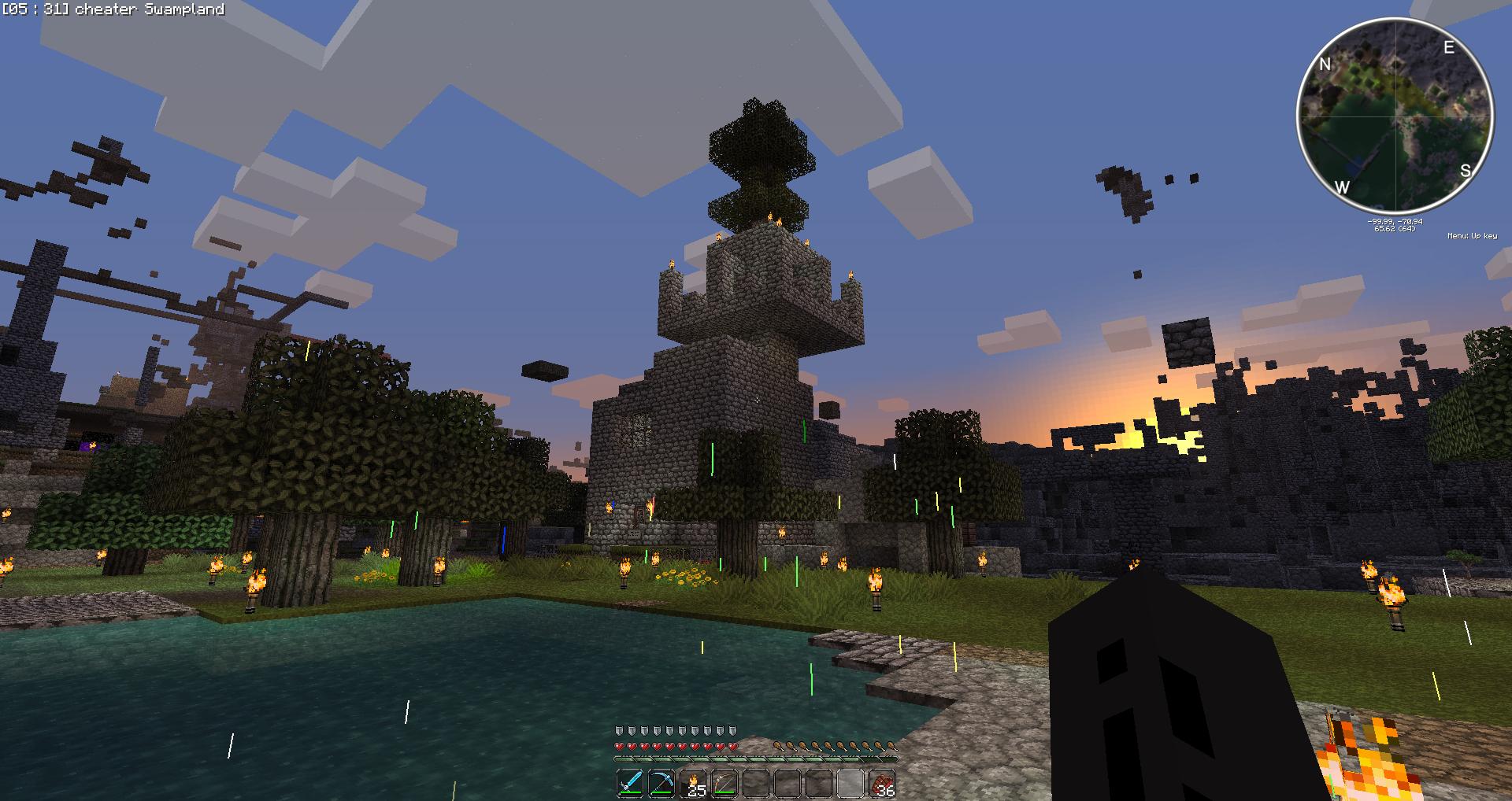 A large castle with a moat, surrounded by trees and a sunset in the background.