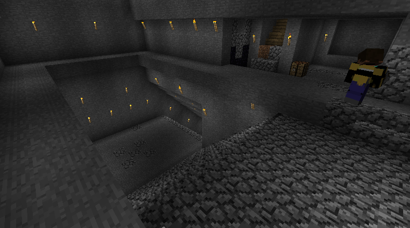 A large underground base with a player and several chests.