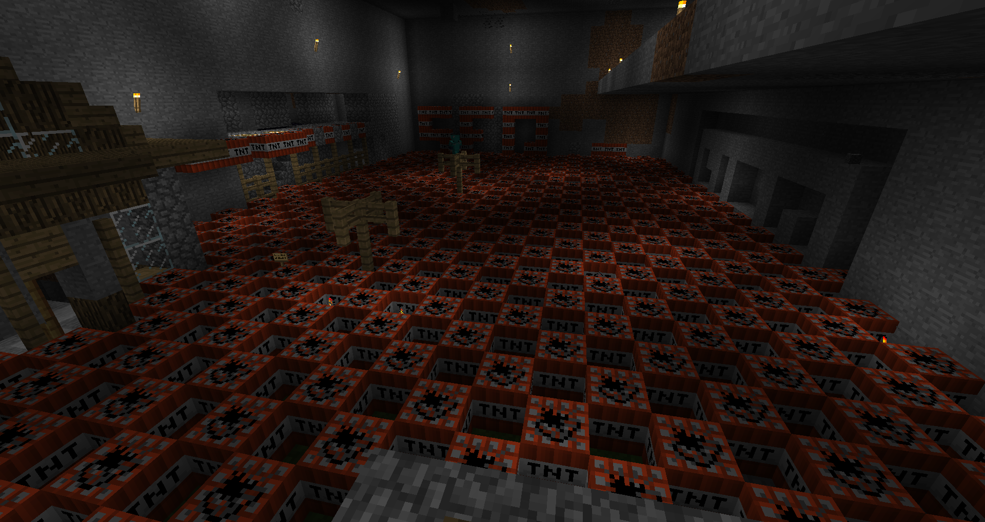 A large room filled with TNT blocks, with a few players standing in the center.