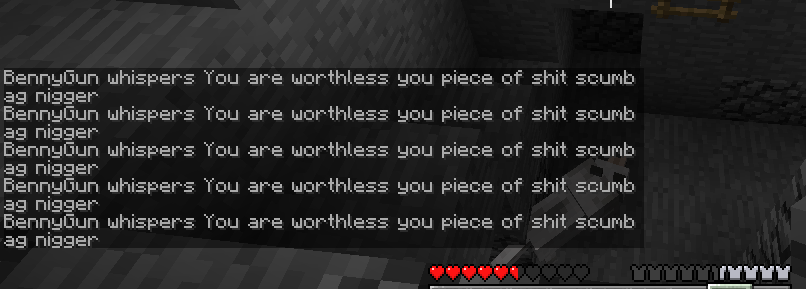 A player is standing in a dark room with a large amount of chat messages on the screen.