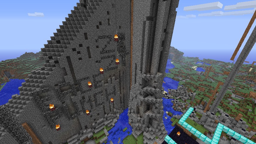 A large, intricate build with many details and features, including a large tower and a moat.