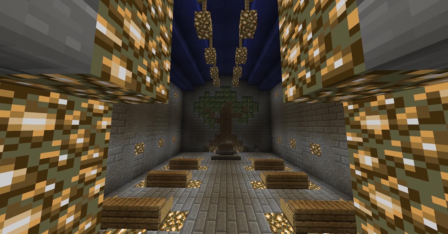 A room with a tree in the center, surrounded by gold blocks and chests.