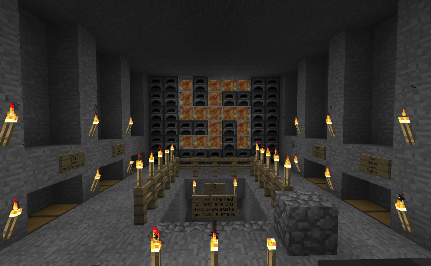 A large underground room with a cross made of lava in the center, surrounded by lit torches and signs on the walls.