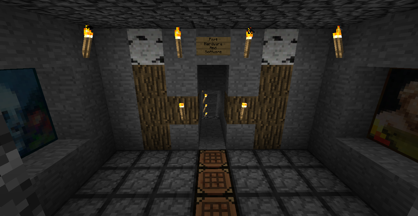A dimly lit room with a long hallway, featuring a series of signs and paintings on the walls.