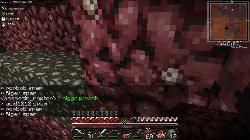 A player is in a cave with a large amount of redstone and obsidian, with chat messages visible.