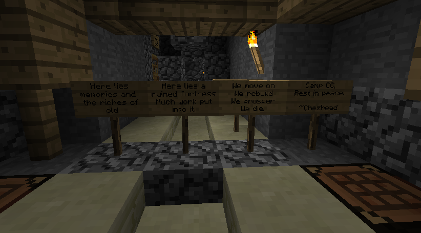 A long hallway with a sign in the middle and a hole in the ground.
