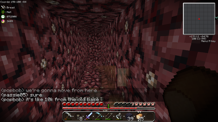 A player is in a long, narrow tunnel with red and black pixelated walls, surrounded by chat messages.