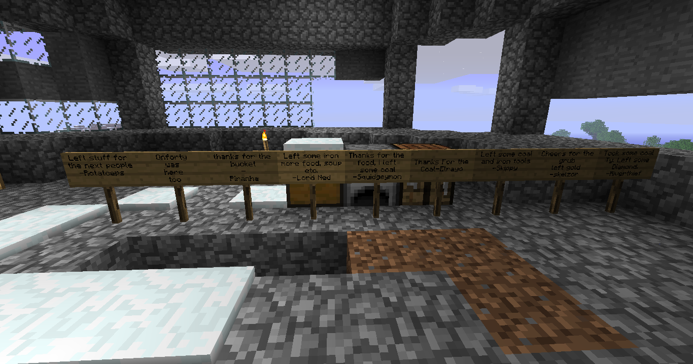 A large room with many signs and a few players, possibly a base or event.