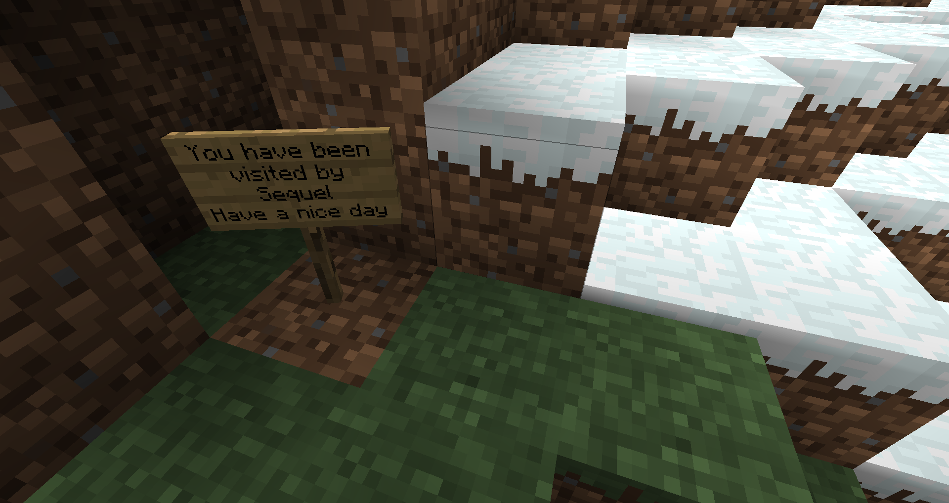 A sign in a cave with a message from Sequel, and another sign with a message from Sequel.