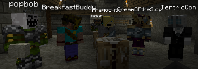 A group of players standing in a room with a table in the center, surrounded by various items and blocks.