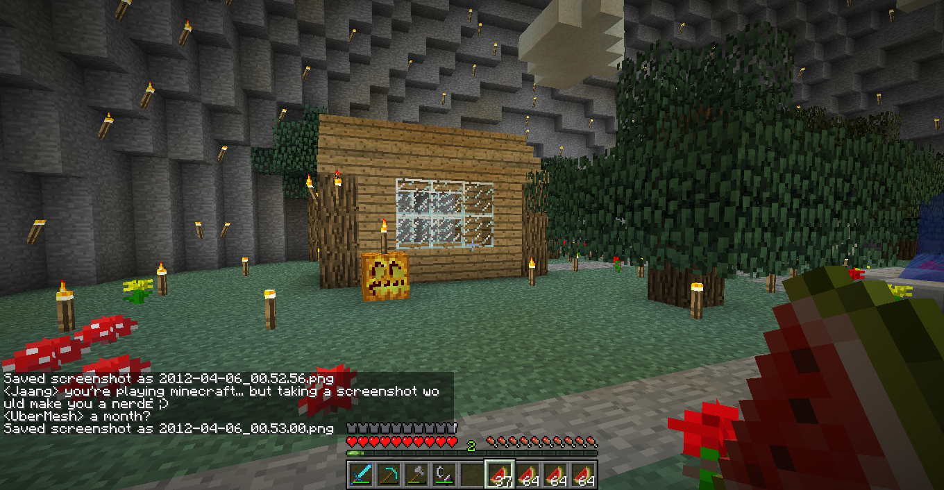 A small wooden house with a pumpkin and trees in front of it, surrounded by mushrooms and a path leading to the house.