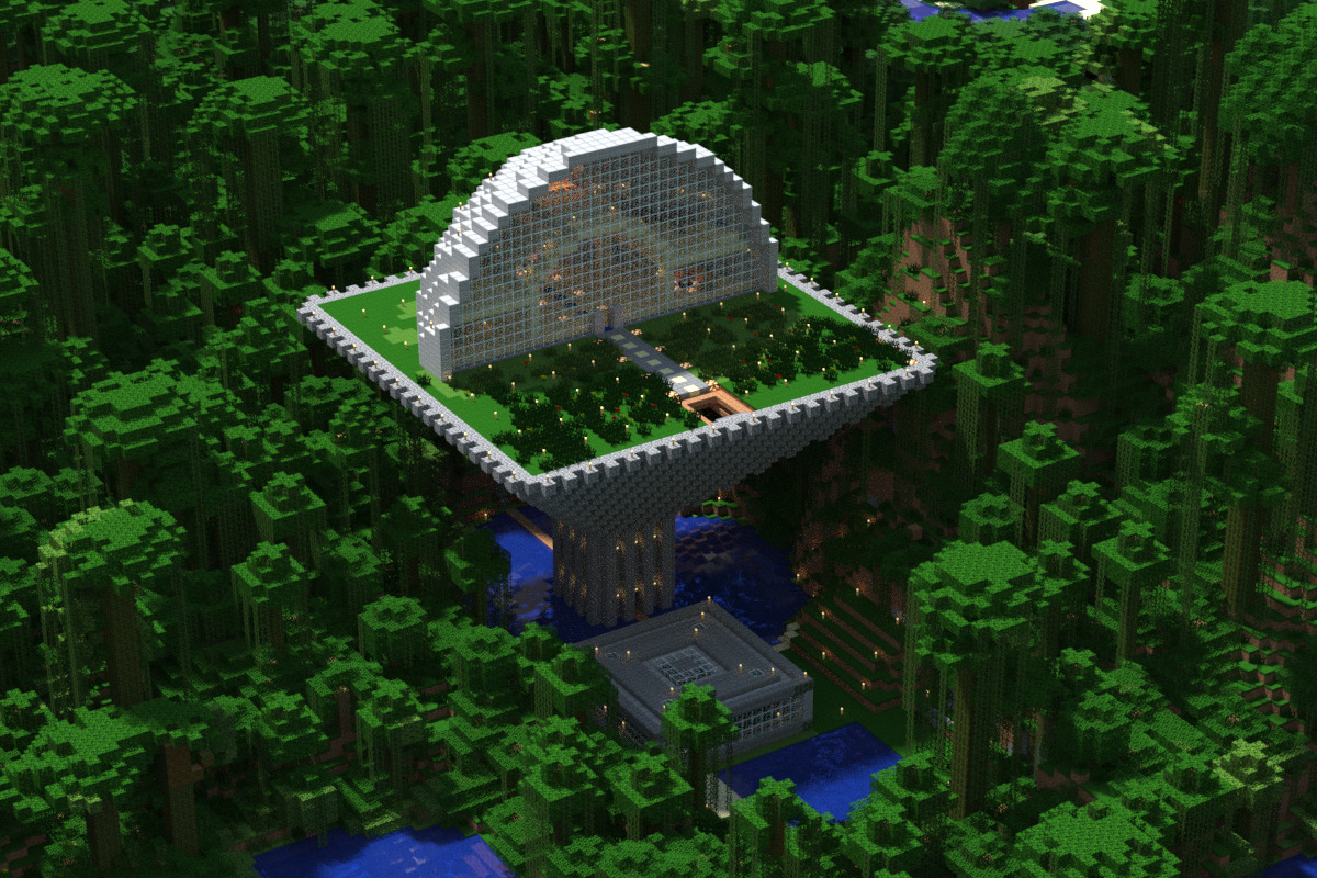 A large, white, domed structure in the middle of a forest.