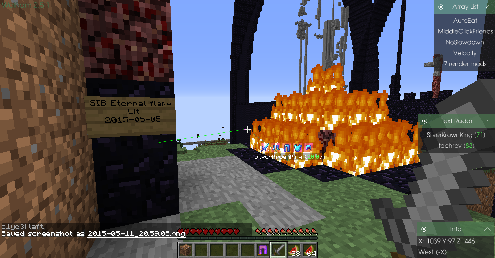 A large fire in the middle of a base, with a sign that says '310 Eternal flame' and a player standing next to it.
